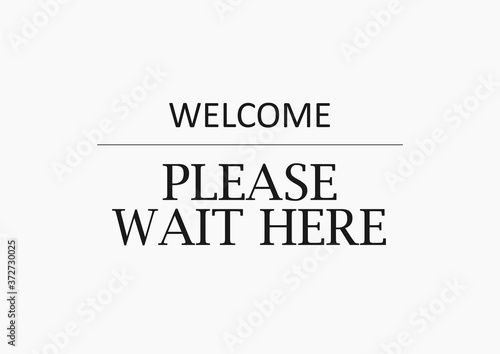Welcome please wait here sign