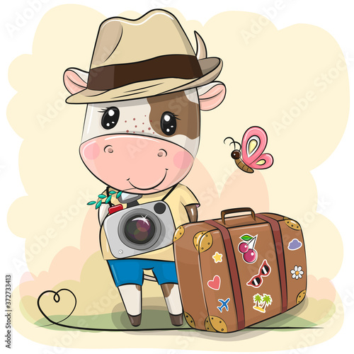 Cartoon Bull tourist in a hat with luggage