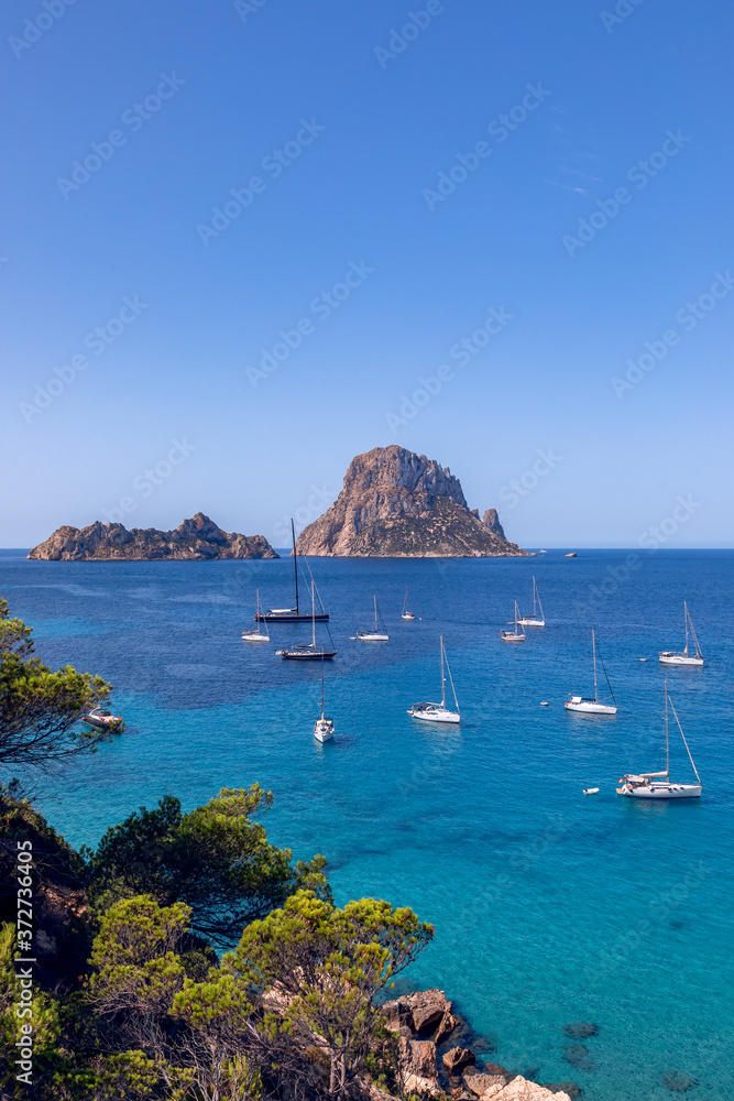 Obraz premium Beautiful view of the island Es Vedra and turquoise sea. Ibiza, Balearic Islands. Spain