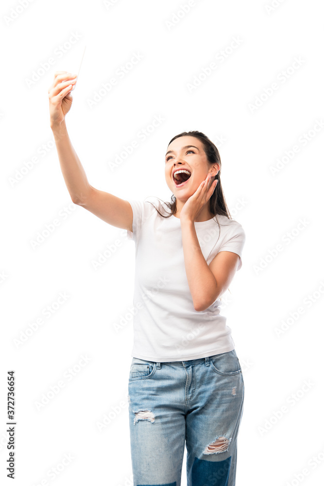 excited brunette woman in white t-shirt taking selfie isolated on white excited brunette woman in white t-shirt taking selfie isolated on white