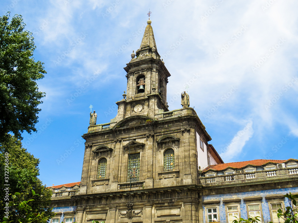 A close-up photo of Santíssima Trindade (Holy Trinity) Church at Porto, Portugal, an exemplar of neoclassical architecture from the XIX century.