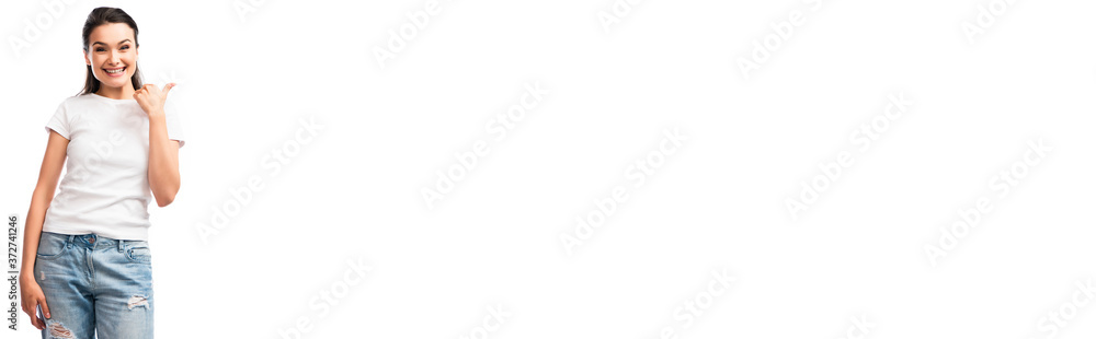 panoramic shot of young woman in white t-shirt and jeans showing thumb up isolated on white panoramic shot of young woman in white t-shirt and jeans showing thumb up isolated on white