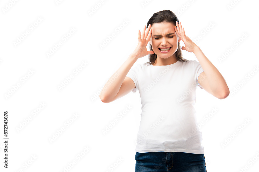 pregnant woman with closed eyes having headache and gesturing isolated on white