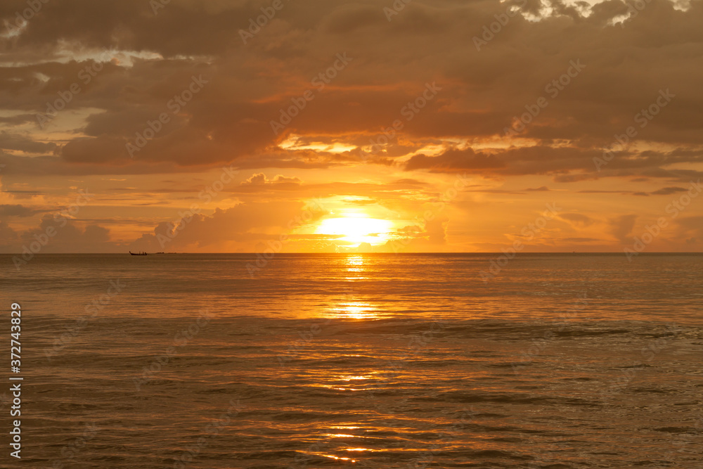 Bronze sunset on the Andaman sea, Kamala beach, Phuket, Thailand