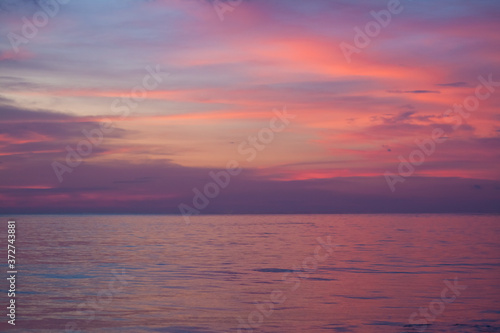 Pink-purple sunset on the andaman sea, Phuket, Kamala beach, Thailand