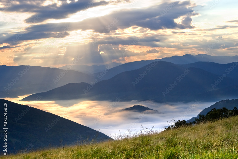 Misty sunrise in the mountains
