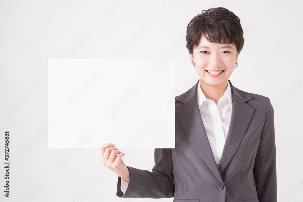 メッセージボードを持つOL