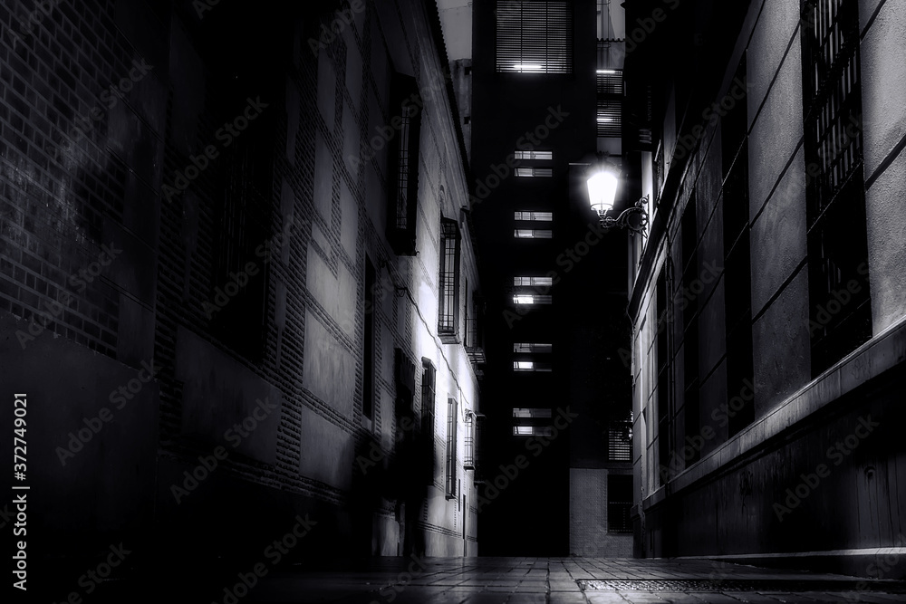 ghosts on the street, Malaga, Spain, monochromatic