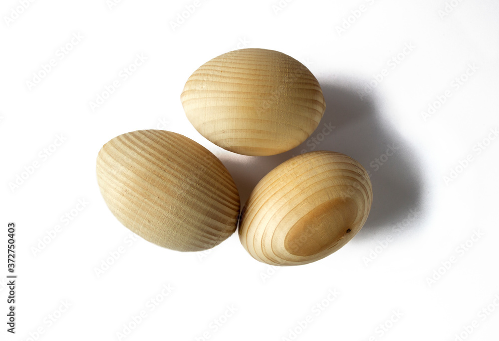 Wooden easter eggs for painting isolated on white background Wooden easter eggs for painting isolated on white background