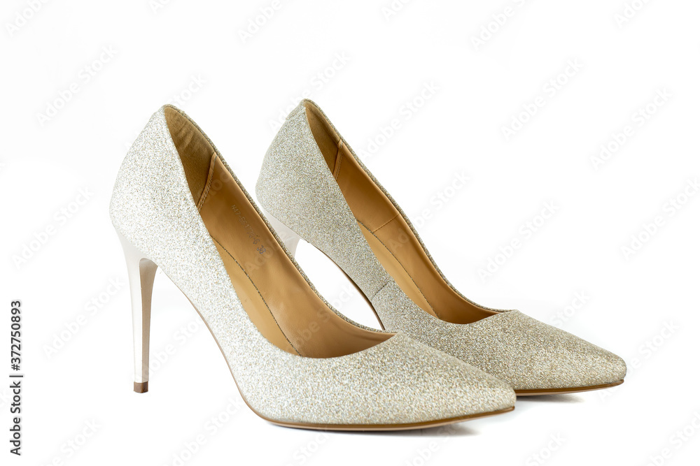 Obraz premium Women's red shoes from a varnish on a white background