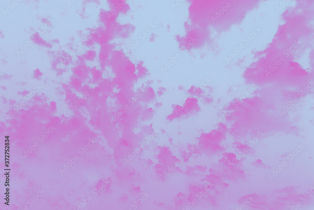 Pink fuchsia color patchy abstract sky background