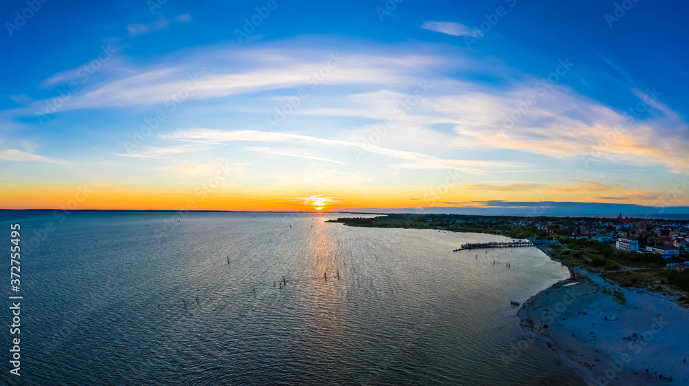 Beautiful Panorama color sky, sunset by the Baltic Sea, Jastarnia, Poland. Aerial View