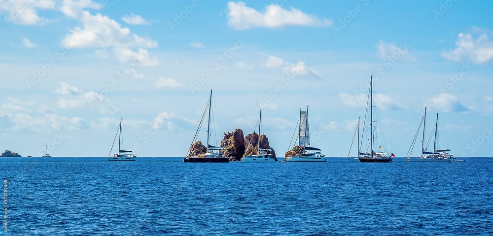 Sailboats moored off the Indian Islets off the main island of Tortola Sailboats moored off the Indian Islets off the main island of Tortola