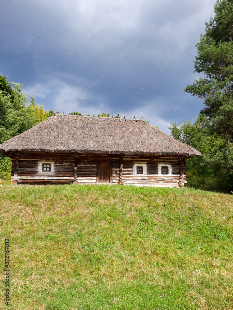 Old ethnic hut and house of Ukraine