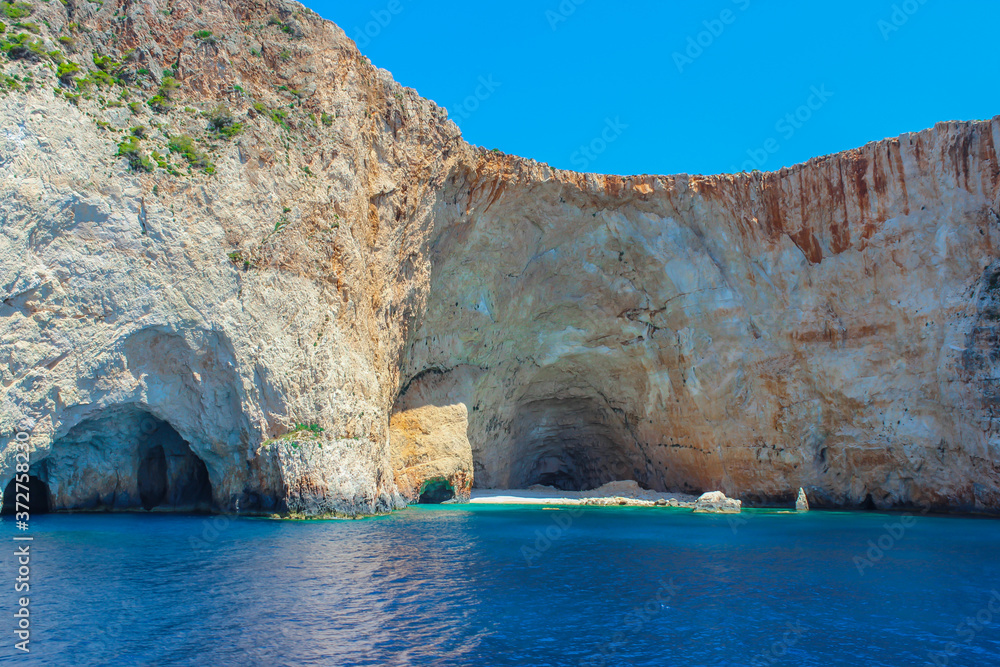 Blue caves on the island of Zakynthos in Greece. Stunning scenery. Ionian sea. Boat trip around the island. Mediterranean.
