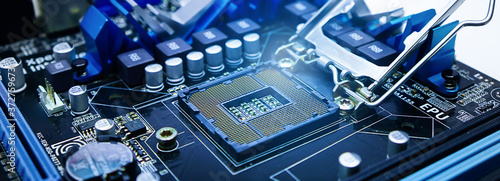 Socket for the motherboard with light Computer parts,Technological background.