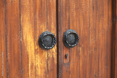 vintage brown door in church © Aghavni