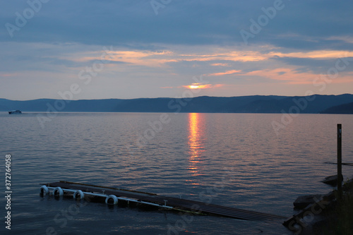 sunset on the shore of lake Baikal