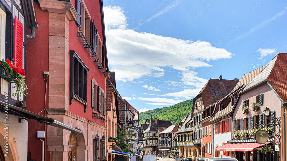 Kaysberg, Alsace, France, summer travel 2020, photo on the streets of Kaisberg, one of the most beautiful Alsatian villages with typical architecture, masked people on the street,