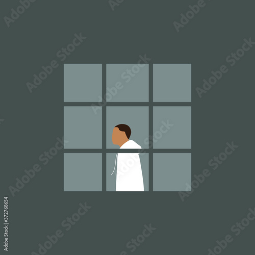 The man in the window behind bars