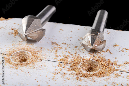 Metal countersink for making holes for screws. Minor jobs in the carpentry workshop.