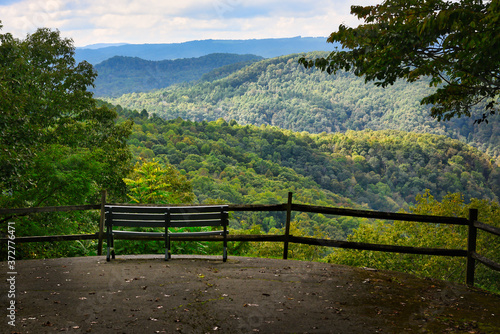 A park bench at a beautiful mountain overlook in West Virginia, USA. 
