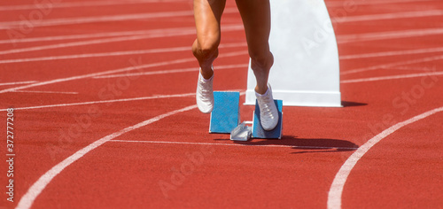 Athletics woman running on the track field