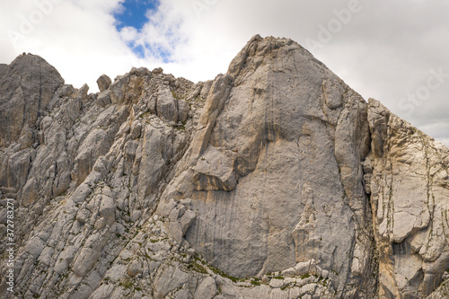 aerial view of some climbers on one of the rocky walls of the corno piccolo in the mountain area of the gran sasso italy abruzzo