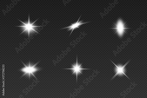 White sparks glitter special light effect. Vector sparkles on transparent background. Christmas abstract pattern. Sparkling magic dust particles
