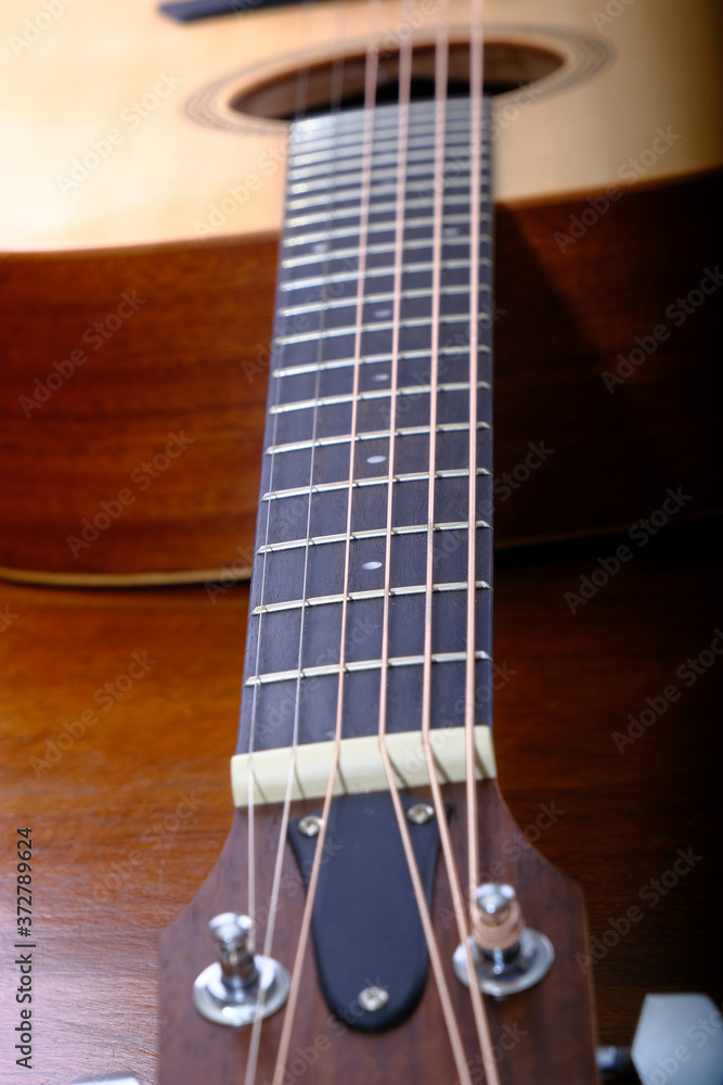 Obraz premium Details on a nice sitka spruce acoustic guitar