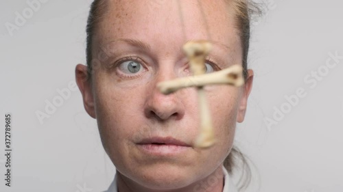 woman watches hypnotic pendulum and faints. businesswoman under hypnosis loses consciousness in spiritualistic session.