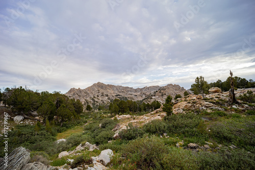 Cloudy view of the beautiful landscape around the Favre Lake trail photo