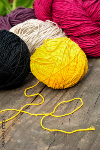 black and yellow yarn balls