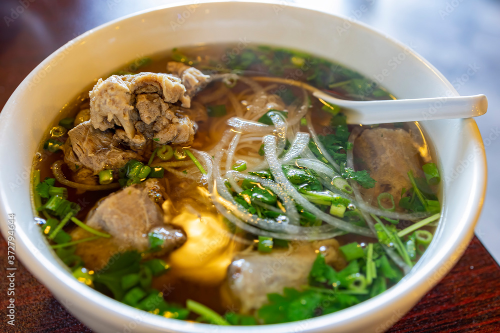 Close up shot of a bowl of delicious Oxtail Pho Close up shot of a bowl of delicious Oxtail Pho
