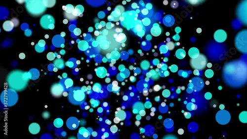 A rotating space with blue particle bubbles