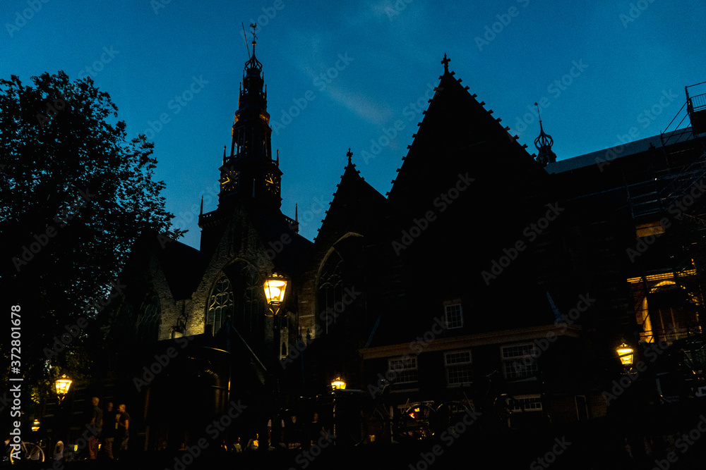 Night Silhouette of a Church in the Canal District of Amsterdam Night Silhouette of a Church in the Canal District of Amsterdam