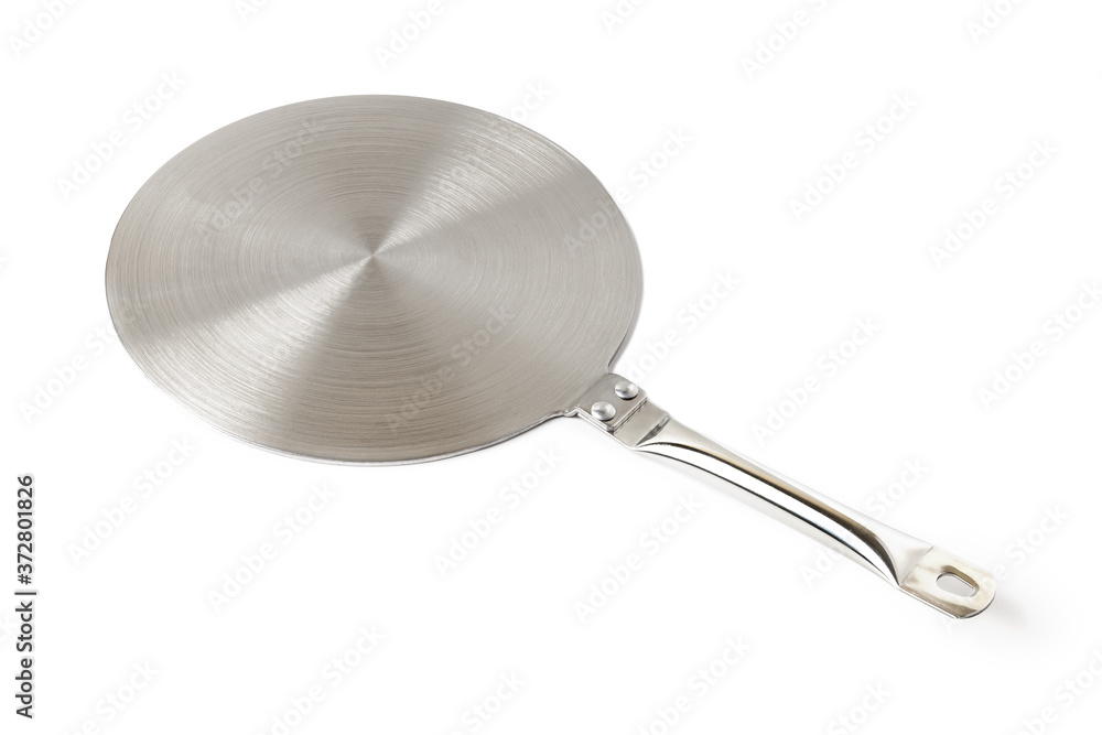 Stainless steel heat diffuser plate isolated on white background. Kitchen appliance for induction hob allows to use small diameter or non-ferromagnetic cookware. Stainless steel heat diffuser plate isolated on white background. Kitchen appliance for induction hob allows to use small diameter or non-ferromagnetic cookware.