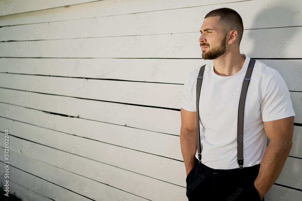 Obraz premium portrait of a young man standing on the street