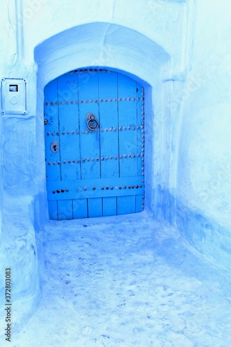 blue door in a house © Heather