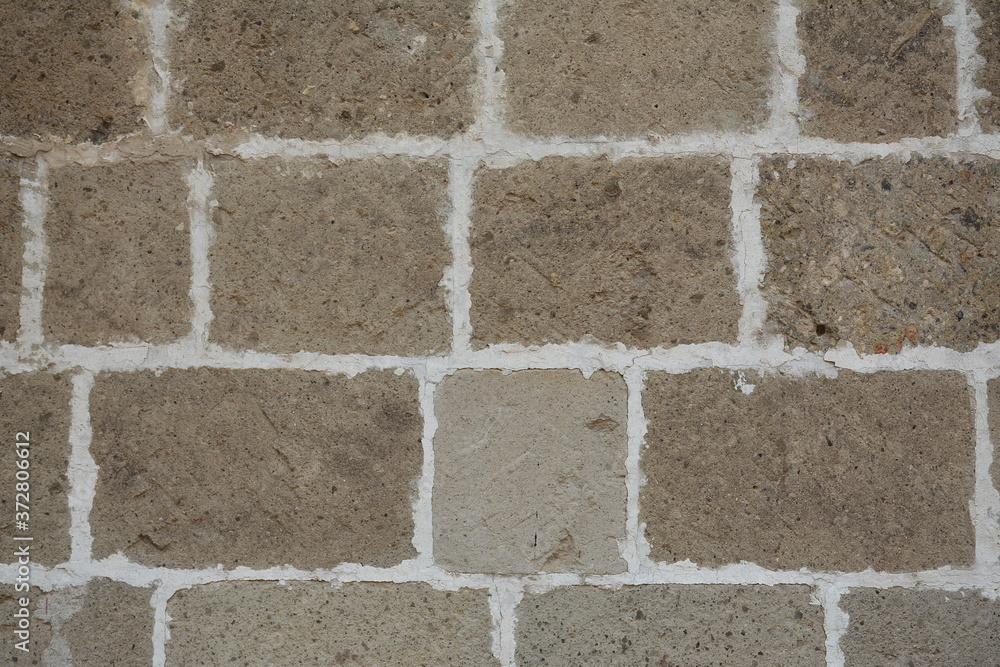 Obraz premium Concrete bricks rough surface brown color background