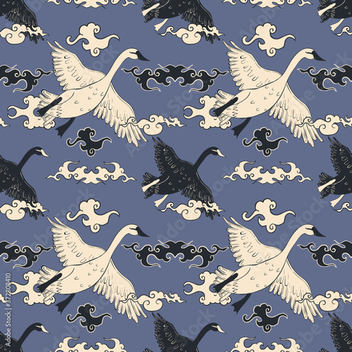 Seamless pattern with flying swan and clouds in asian style.