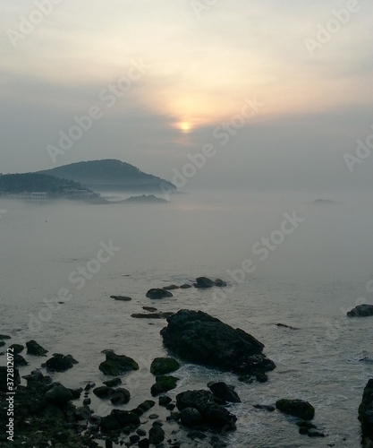 Misty sunrise over the ocean