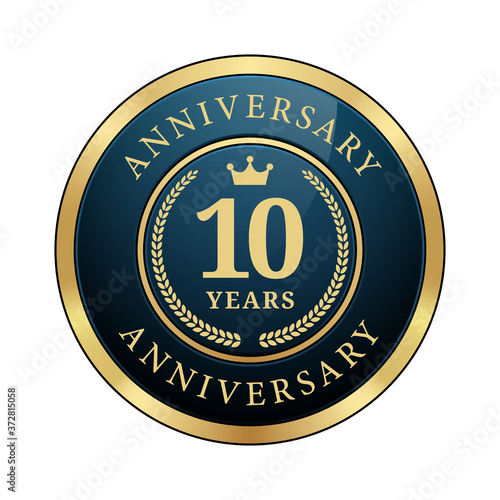 10 years anniversary badge crown laurel wreath glossy dark blue metallic gold round logo