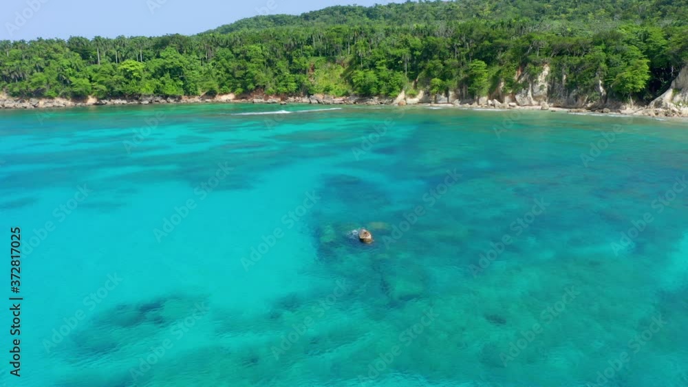Aerial view of a sunken ship in beautiful beach, Dominican Republic, calm turquoise blue waters, clear day, radiant sun Aerial view of a sunken ship in beautiful beach, Dominican Republic, calm turquoise blue waters, clear day, radiant sun