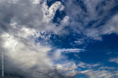 fluffy clouds in the blue sky. deep blue sky. after the rain