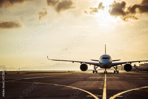 Фототапет Aircraft taxiing to airport runway