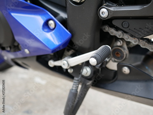foot gear shift pedal in a modern motorcycle.