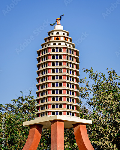 Huge permanent cement pigeon nest or shelter at Nageshwar temple, Dwarka, Gujrat, India. photo