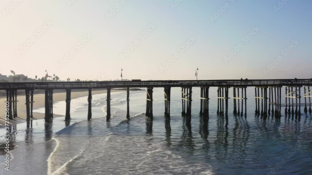Long slider shot from drone a long the length of the Ventura Pier in Ventura, California. 4K Aerial Long slider shot from drone a long the length of the Ventura Pier in Ventura, California. 4K Aerial