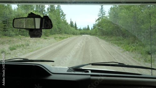 Interior RV Driving POV Dirt Road Highway Mountains Yukon Territory Canada photo